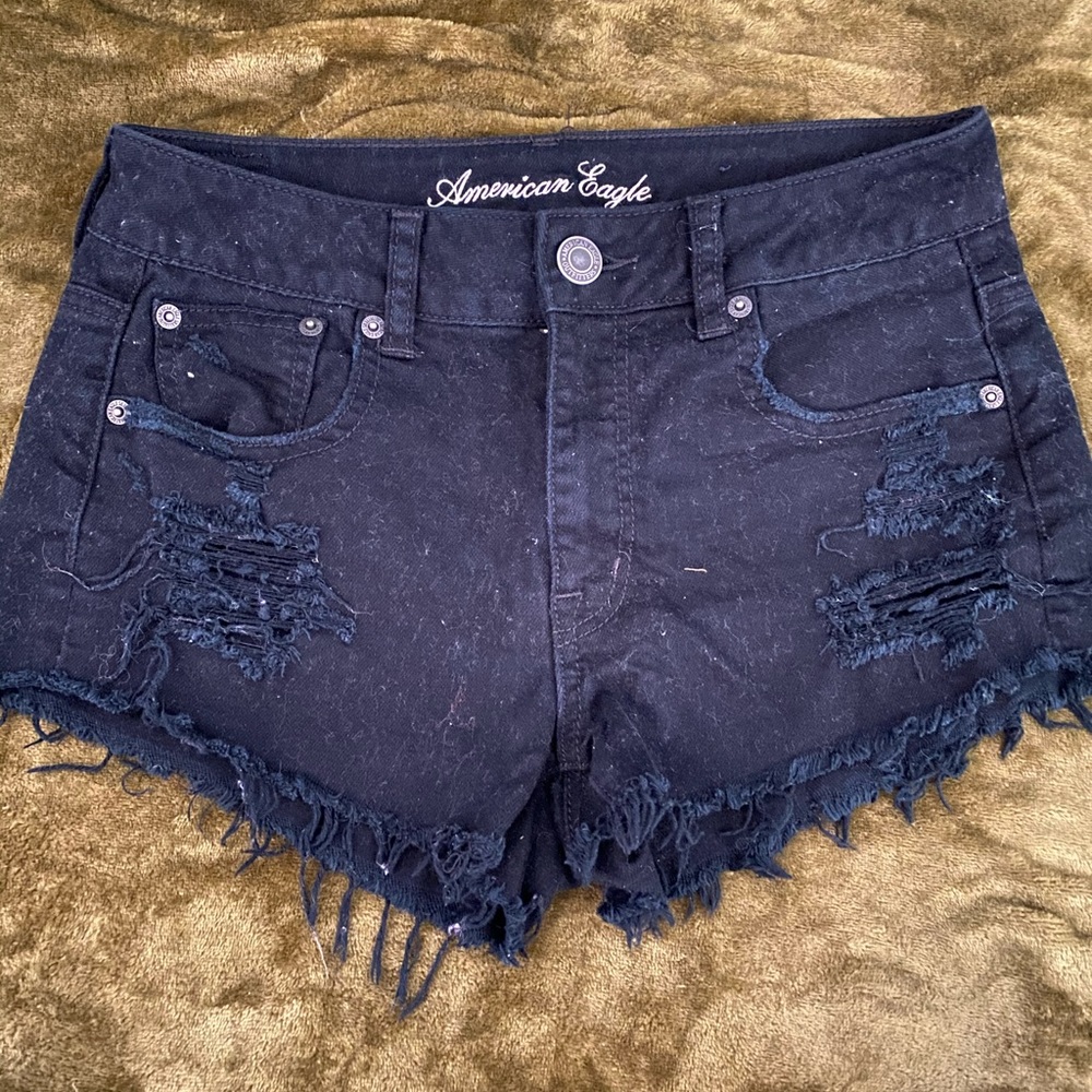 ripped black shorts